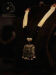 httpssnfancyworld.comwp-contentuploads202112NK-PR-1004-Long-Chain-With-Silver-Pendant-With-Black-Stone-Studded-Rs-410-Only.jpg