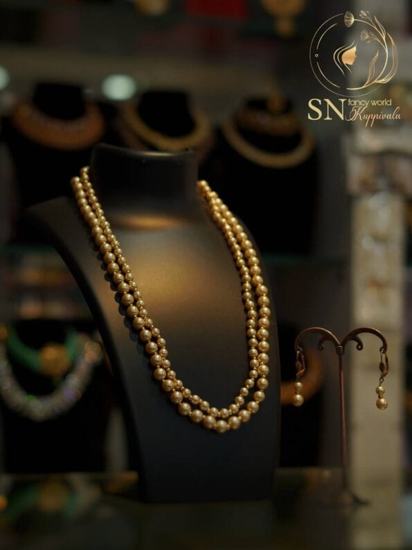 httpssnfancyworld.comwp contentuploads202112NK PR 1007 Golden Pearl Necklace with earings